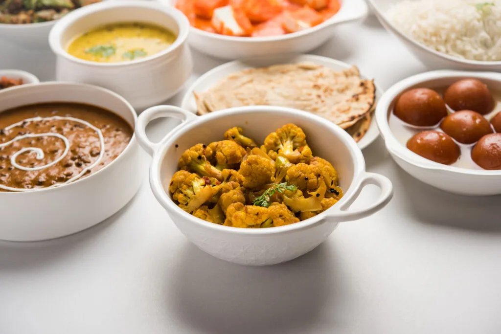Spices East Indian and Nepalese cuisine signature dishes — butter chicken, momos and biryani